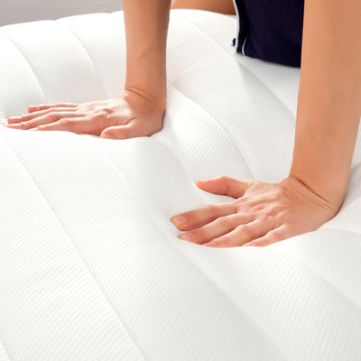 person test the comfiness and firmness of the mattress